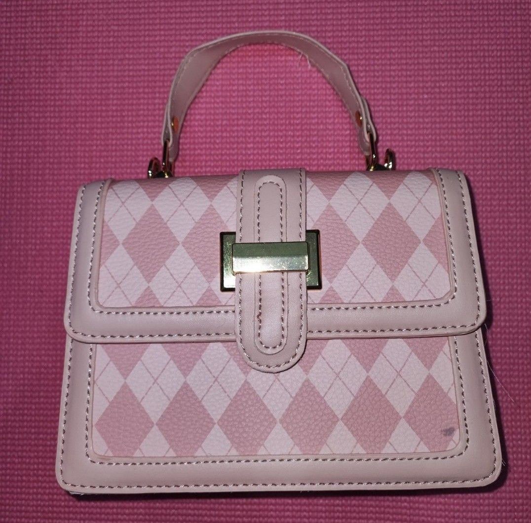 Pink Handbag with Top Handle cute kawaii core (Category: Cross-body Bags) located in San Juan City. Submitted by enbyfangs (Listing ID 1430133016, Image 1). Description: — never used — has visible flaws — please manage your expections 📋 has strap to use as sling bag gcash or bdo jnt ggx lbc sco sdd.