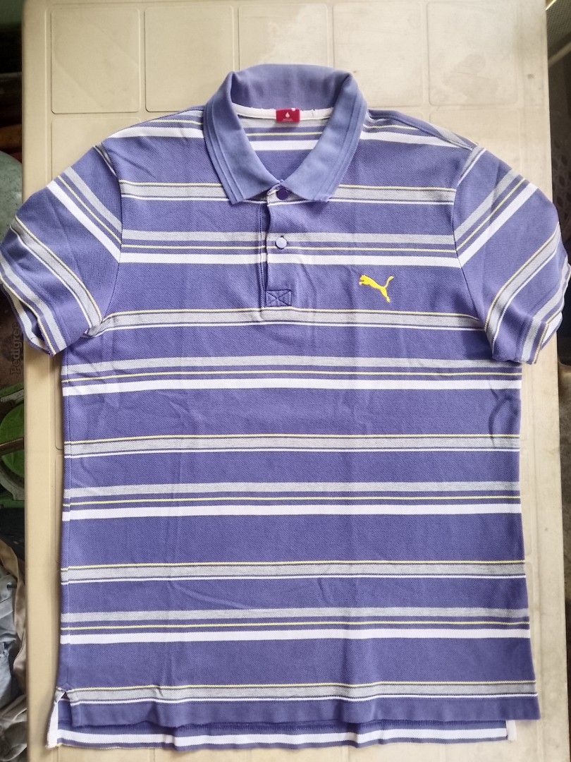 Puma Archive Striped Polo Shirt (Category: Tshirts & Polo Shirts ) located in Manila. Submitted by panbreaks417 (Listing ID 1430040114, Image 1). Description: Check pics for issue (2 small pinholes) Good Condition Color Rate - 10/10 Medium - Large.