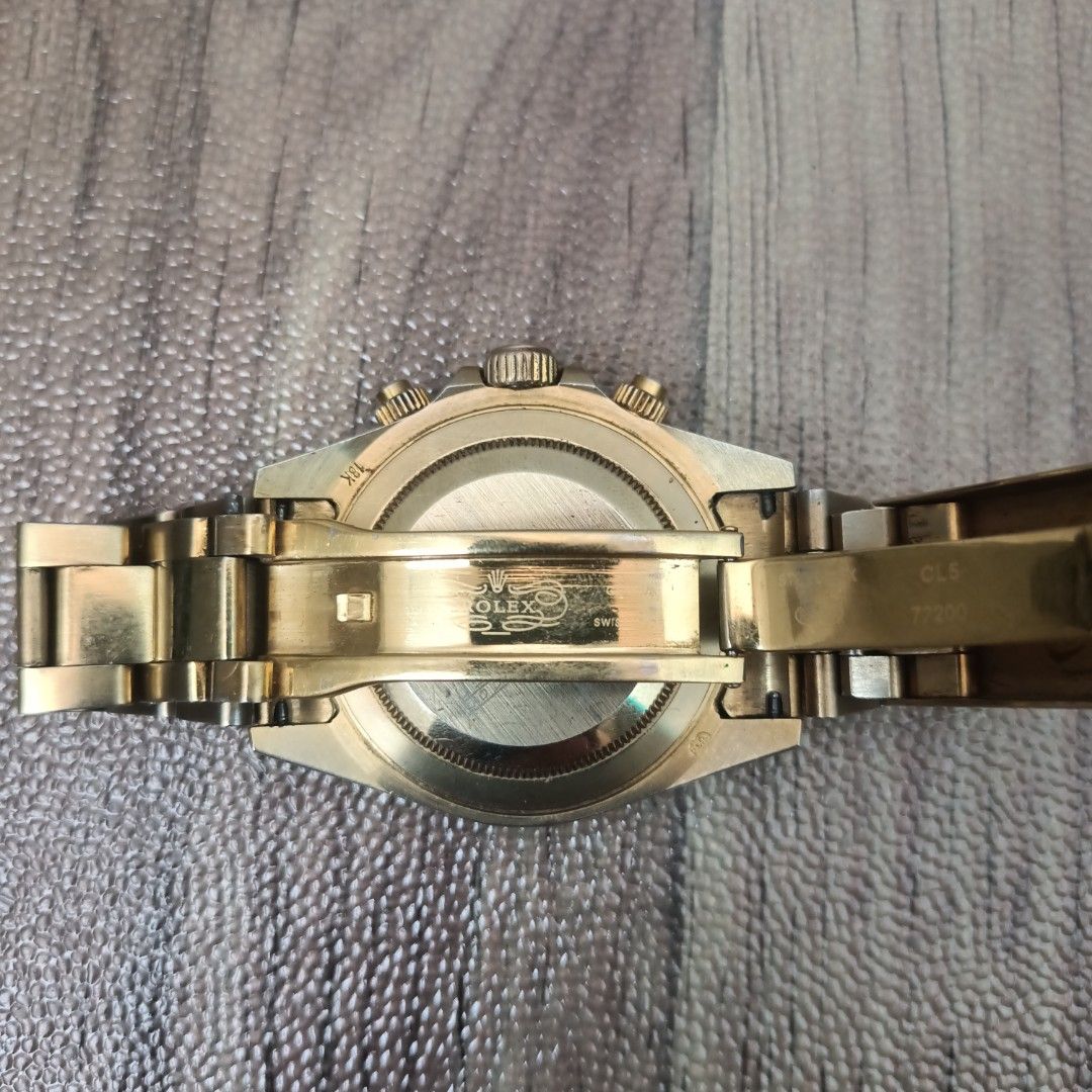 Rolex Zenith Gold (Category: Luxury Watches) located in Bacolor. Submitted by freespot.acph (Listing ID 1430108100, Image 3). Description: Gold Rolex Daytona watch. Features a gold dial with chronograph subdials. The watch has a gold bracelet and a stainless steel case back. The back of the watch is engraved with the Rolex logo and model number. The watch has a bezel with tachymeter scale. ho directly message 📩.