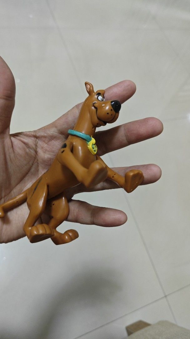 Scooby-Doo Action Figures Set (Category: Figurines & Statues) located in Manila. Submitted by skyreva (Listing ID 1430158631, Image 2). Description: Set includes three Scooby-Doo action figures: Velma, Fred, and Scooby-Doo..