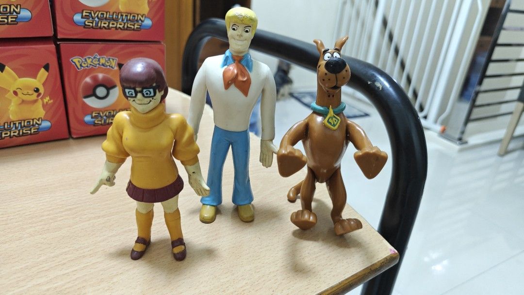 Scooby-Doo Action Figures Set (Category: Figurines & Statues) located in Manila. Submitted by skyreva (Listing ID 1430158631, Image 1). Description: Set includes three Scooby-Doo action figures: Velma, Fred, and Scooby-Doo..