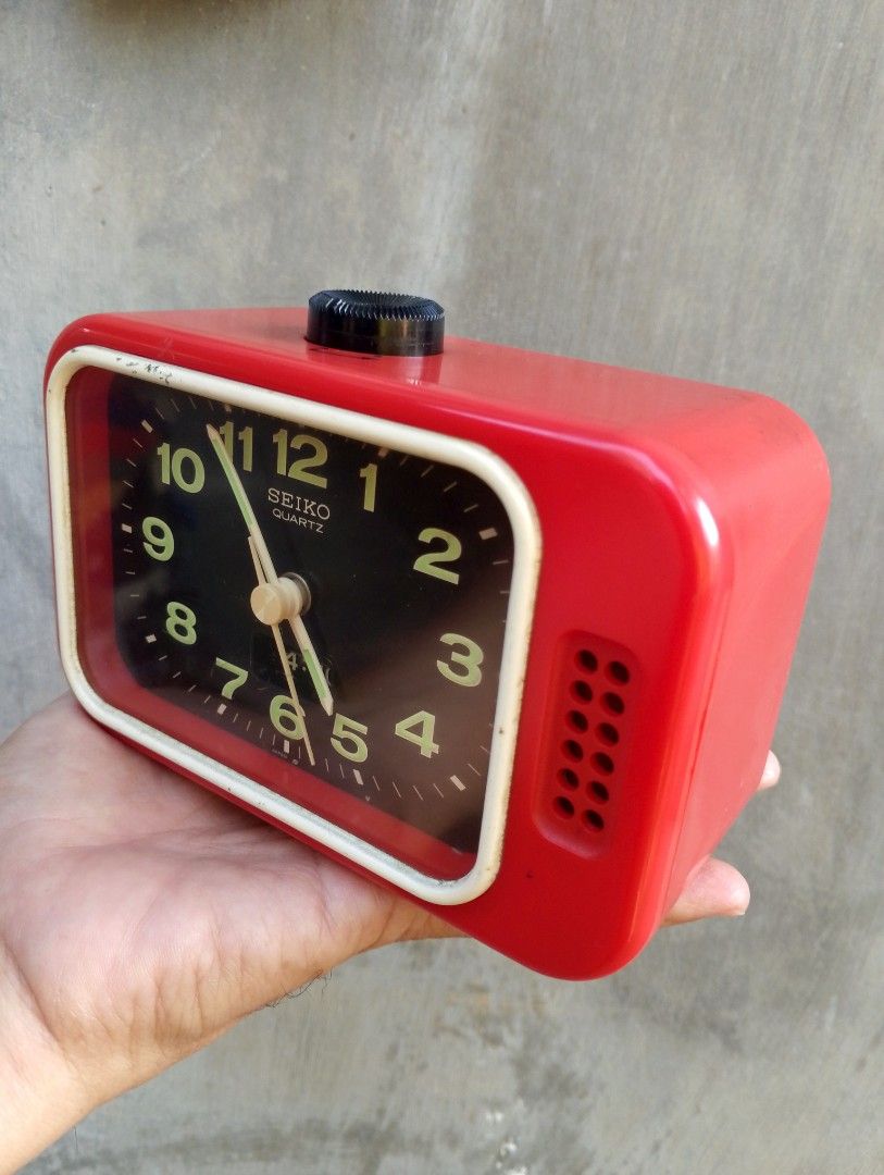 Vintage Seiko Quartz Red Alarm Clock (Category: Clocks) located in Binangonan. Submitted by stufflikedat (Listing ID 1430117743, Image 3). Description: Vintage Seiko red analog bell alarm clock, featuring a retro television design with a black dial and quartz movement, includes a quiet sweep second hand to reduce noise & features numerical alarm display & luminous hands and numerals for visibility in the dark, with a bell alarm and includes a sno