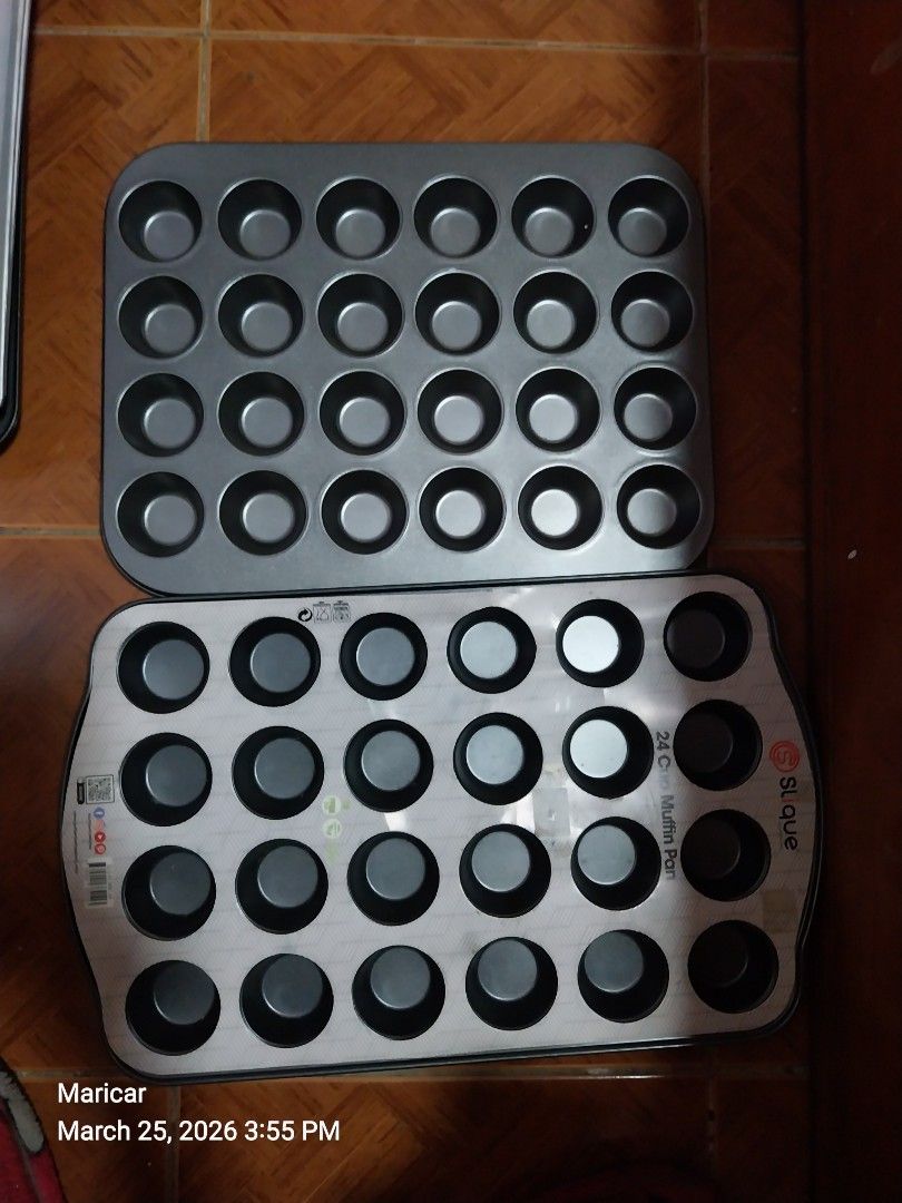 Slique/ Chef Classic 24 Cup Muffin Pan (Category: Bakeware) located in Pasig City. Submitted by rare.ashima25 (Listing ID 1430101312, Image 1). Description: Set of two muffin pans. One pan has 24 cups, and the other has 24 cups as well. The pans are made of metal and are likely used for baking muffins or cupcakes. The brand name "Si Que" is visible on one of the pans. Perfect for baking enthusiasts!.