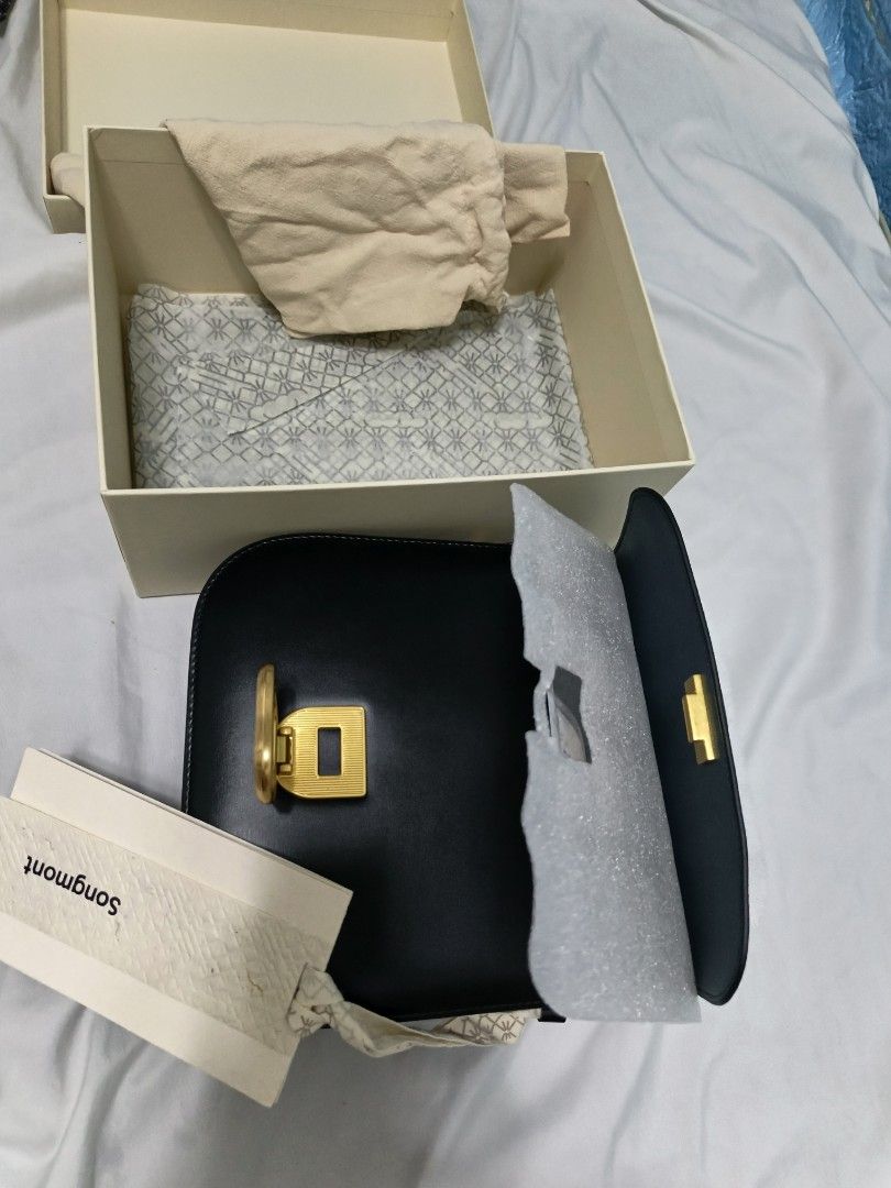 Songmont Luna Bag (Category: Luxury Bags & Wallets) located in Manila. Submitted by humananony63741 (Listing ID 1430119420, Image 1). Description: Brand New SONGMONT BAG Complete accessories.