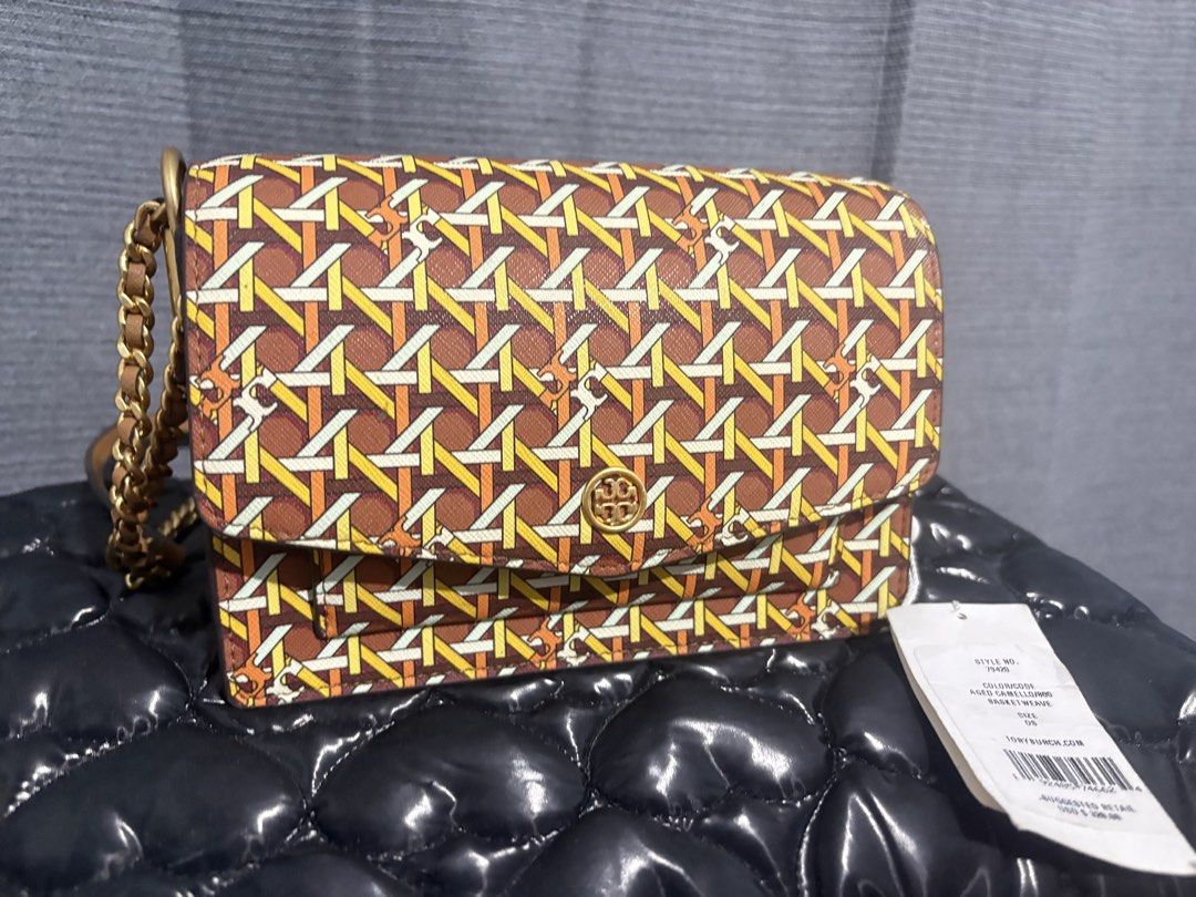 Tory Burch Basketweave Crossbody Bag (Category: Luxury Bags & Wallets) located in Baguio. Submitted by ktlyncsn (Listing ID 1430206565, Image 1). Description: WTS: Authentic Tory Burch Robinson Basketweave Crossbody Color: Aged Camello / 800 Style No: 79420 Condition: 9/10 only used twice! super kinis! Inclusions: Original Hangtag included (No dust bag) Note: Original retail $328. Super pretty and unique basketweave pattern. Perfect for summer/ca