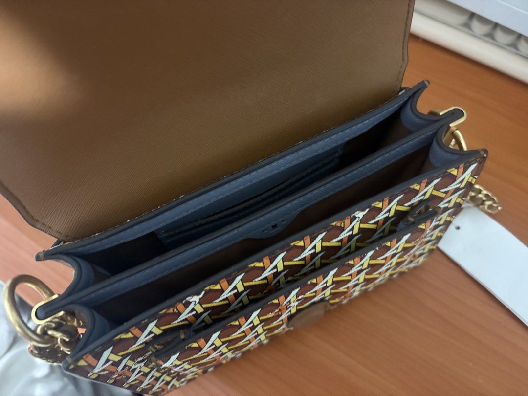 Tory Burch Basketweave Crossbody Bag (Category: Luxury Bags & Wallets) located in Baguio. Submitted by ktlyncsn (Listing ID 1430206565, Image 3). Description: WTS: Authentic Tory Burch Robinson Basketweave Crossbody Color: Aged Camello / 800 Style No: 79420 Condition: 9/10 only used twice! super kinis! Inclusions: Original Hangtag included (No dust bag) Note: Original retail $328. Super pretty and unique basketweave pattern. Perfect for summer/ca