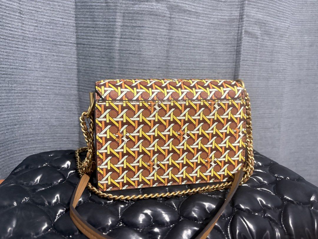 Tory Burch Basketweave Crossbody Bag (Category: Luxury Bags & Wallets) located in Baguio. Submitted by ktlyncsn (Listing ID 1430206565, Image 2). Description: WTS: Authentic Tory Burch Robinson Basketweave Crossbody Color: Aged Camello / 800 Style No: 79420 Condition: 9/10 only used twice! super kinis! Inclusions: Original Hangtag included (No dust bag) Note: Original retail $328. Super pretty and unique basketweave pattern. Perfect for summer/ca