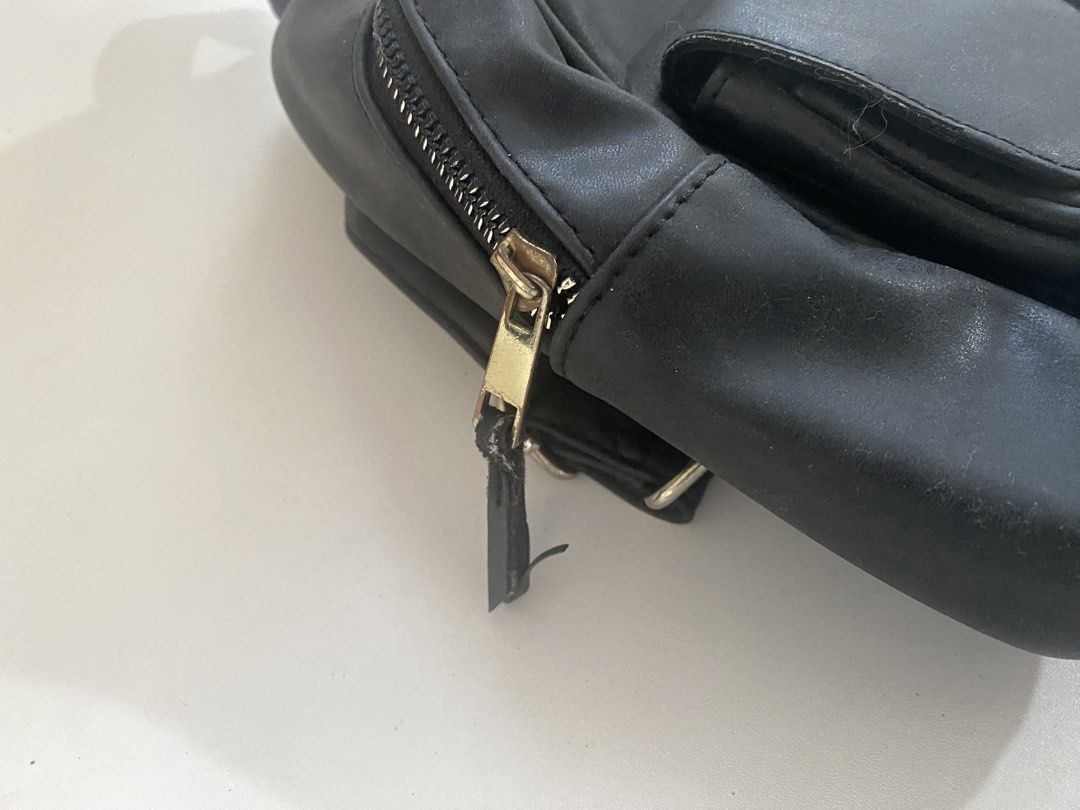 TYPO Mini Black Leather Backpack (Category: Backpacks) located in Manila. Submitted by teenagegirling (Listing ID 1430108739, Image 3). Description: ₱300 - TYPO Mini Black Backpack 📝 7/10 condition 📝 was bought in singapore 📝 slight peeling and creasing MOP - GCash MOD - Lalamove, J&T.