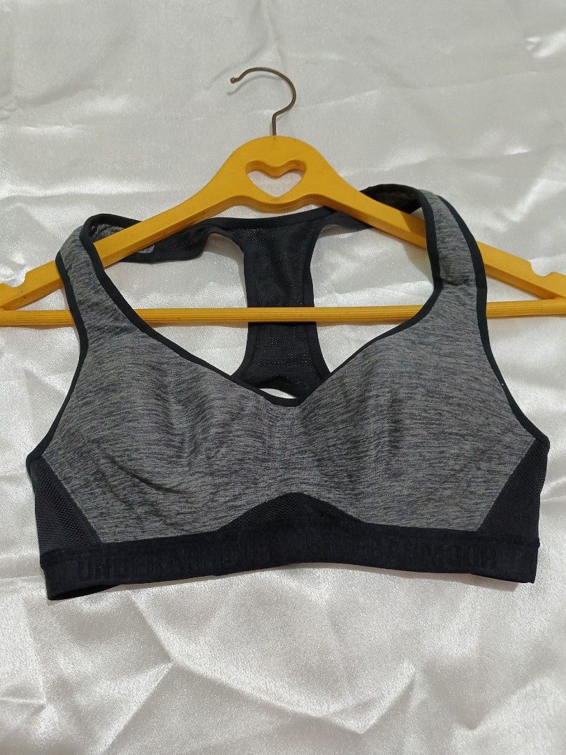 Under Armour Sports Bra (Category: Activewear) located in Bago City. Submitted by cossacloset (Listing ID 1430063692, Image 1). Description: Under Armour sports bra features a racerback design for enhanced mobility. It has a gray and black color scheme. The back has a hook-and-eye closure for an adjustable fit. Best fits xs-s. Padded. .