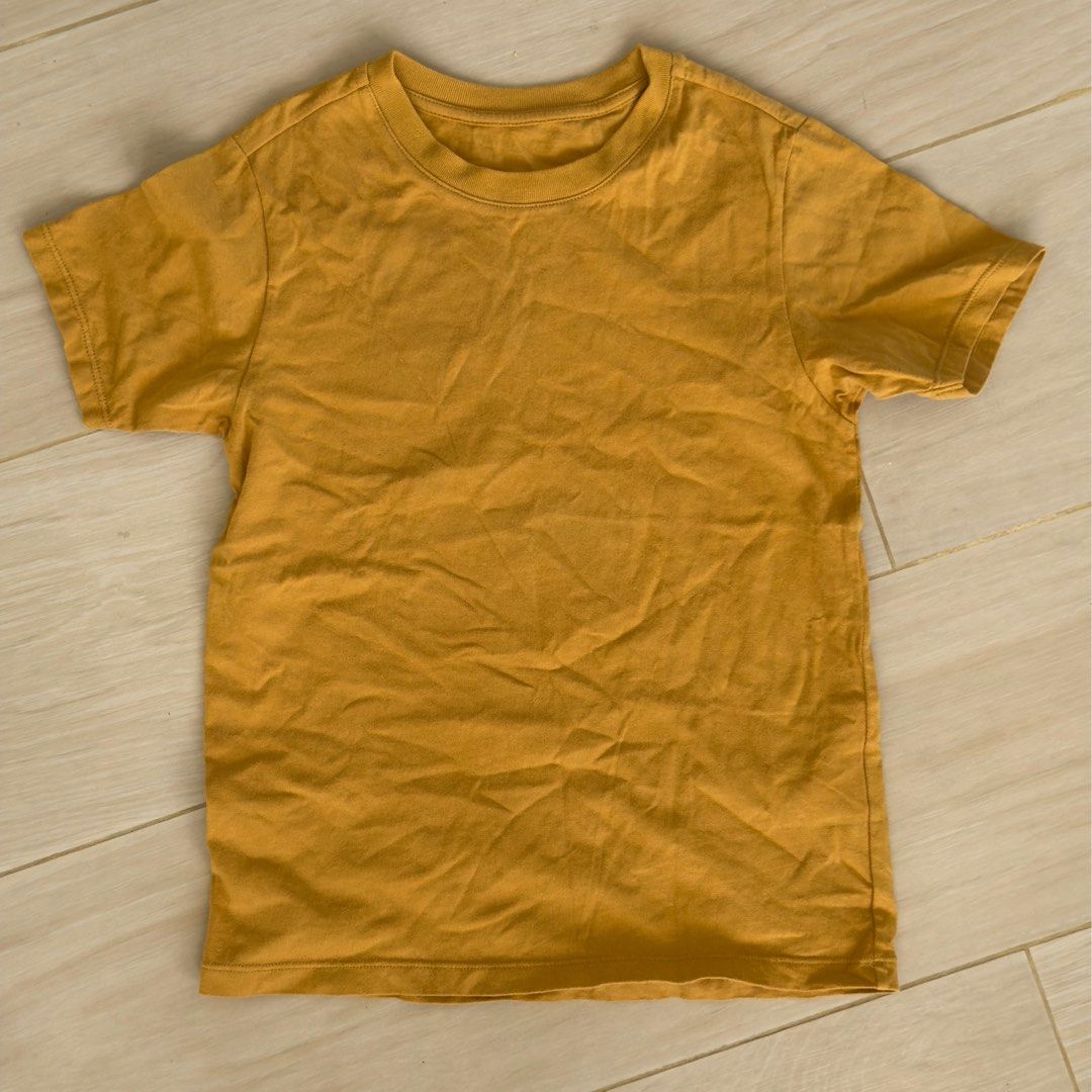 Uniqlo Kids Mustard Yellow T-shirt (size 130) (Category: Babies & Kids Fashion) located in Calamba. Submitted by letsygread9 (Listing ID 1430209220, Image 1). Description: .