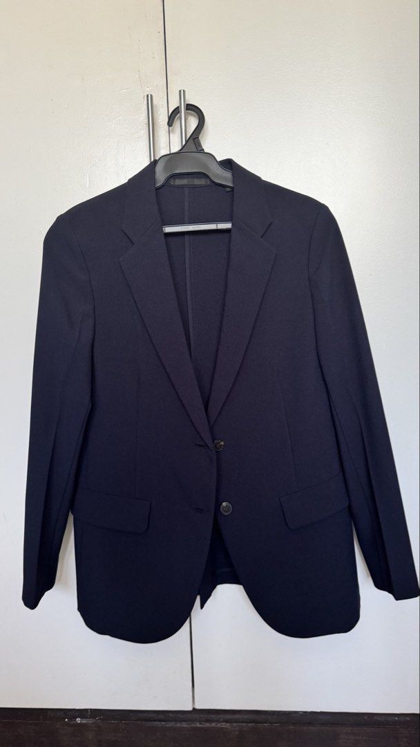 Uniqlo Miracle Air Blazer - Navy Size S (Category: Coats, Jackets and Outerwear) located in Paranaque City. Submitted by allymadamba (Listing ID 1430143300, Image 1). Description: Worn twice — great for tropical summers. I needed a warmer coat. Bought for 2990.