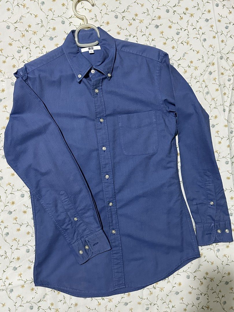 Uniqlo Oxford Button-Down Shirt (Category: Tshirts & Polo Shirts ) located in Manila. Submitted by p2129_ (Listing ID 1430074838, Image 1). Description: Uniqlo longsleeves blue Small Pit to pit: 18.5 inches Length: front 28 back 28.5 inches Buttons are complete #uniqlo #h&m #zara #longsleeves.