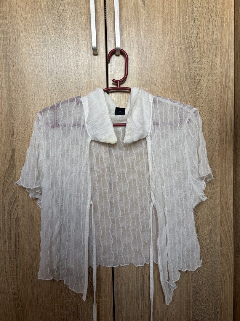 White Sheer Top and Orange V-neck Top (Category: Blouses) located in Antipolo. Submitted by softprelovedbyaly (Listing ID 1430110757, Image 1). Description: • white, sheer, short-sleeved cover top with tie closures • orange bikini top.