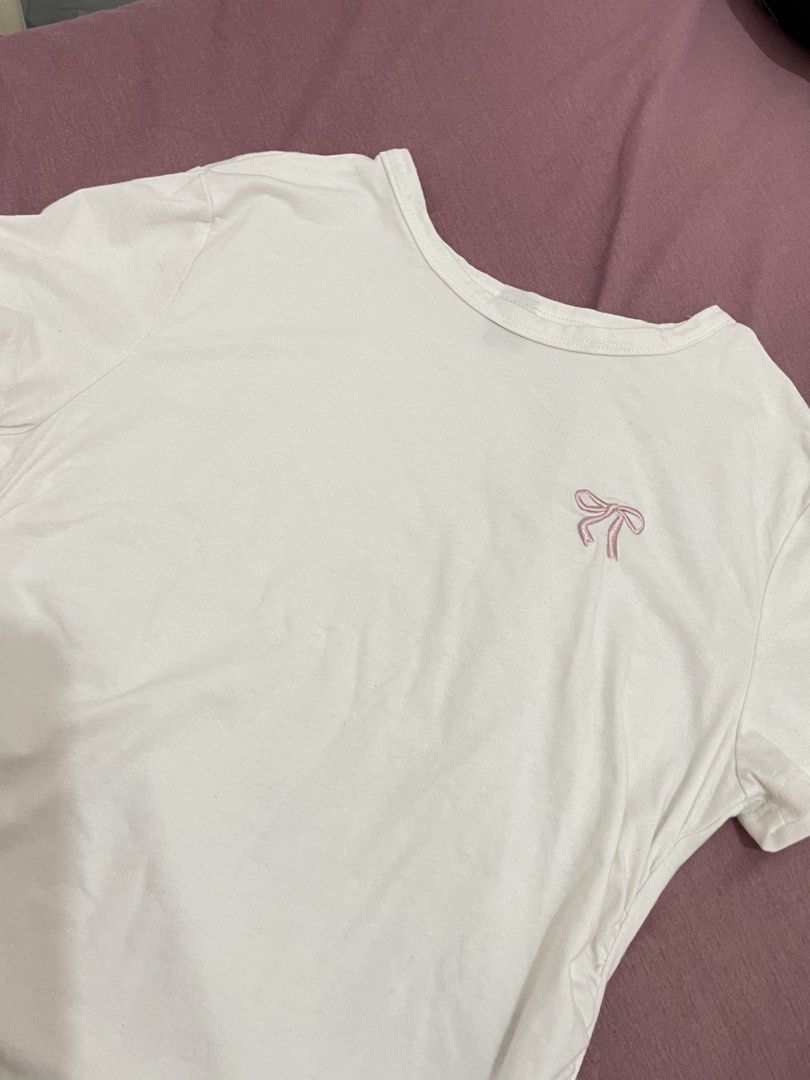 White Shirt with Pink Ribbon (Category: Shirts) located in Taguig. Submitted by destashph_ (Listing ID 1430102352, Image 2). Description: .