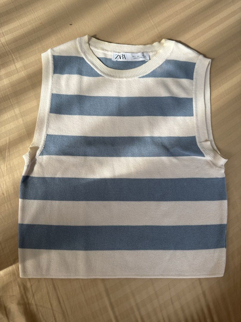 Zara Basic Striped Sleeveless Top (Category: Sleeveless) located in Davao. Submitted by therealtrader8 (Listing ID 1430094707, Image 1). Description: Slight discoloration around the neck.