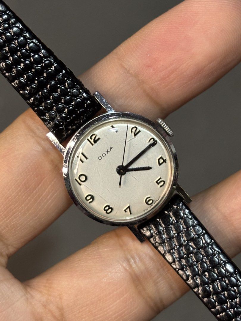 1960’s Doxa Manual Winding Watch (Category: Luxury Watches) located in Manila. Submitted by soughtafterseconds (Listing ID 1430253874, Image 2). Description: 1960’s Doxa Manual Winding Watch Long before they conquered the oceans, Doxa was perfecting the art of the Swiss dress watch. The case is typically slim with subtle, curved lugs, designed to disappear under a suit cuff. It embodies the “Bauhaus” philosophy—where form follows function—which D