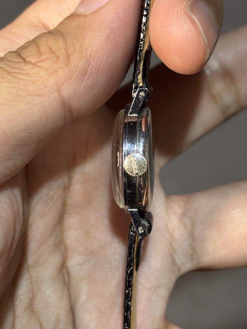 1960’s Doxa Manual Winding Watch (Category: Luxury Watches) located in Manila. Submitted by soughtafterseconds (Listing ID 1430253874, Image 3). Description: 1960’s Doxa Manual Winding Watch Long before they conquered the oceans, Doxa was perfecting the art of the Swiss dress watch. The case is typically slim with subtle, curved lugs, designed to disappear under a suit cuff. It embodies the “Bauhaus” philosophy—where form follows function—which D