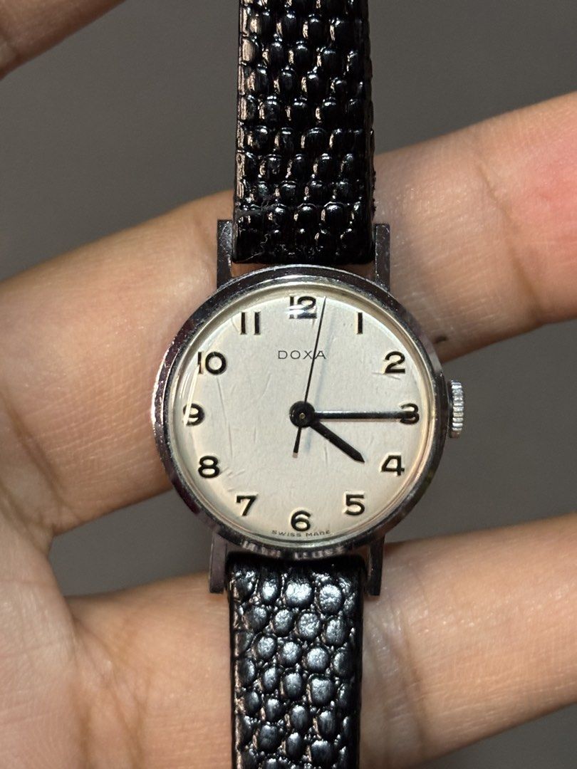 1960’s Doxa Manual Winding Watch (Category: Luxury Watches) located in Manila. Submitted by soughtafterseconds (Listing ID 1430253874, Image 1). Description: 1960’s Doxa Manual Winding Watch Long before they conquered the oceans, Doxa was perfecting the art of the Swiss dress watch. The case is typically slim with subtle, curved lugs, designed to disappear under a suit cuff. It embodies the “Bauhaus” philosophy—where form follows function—which D