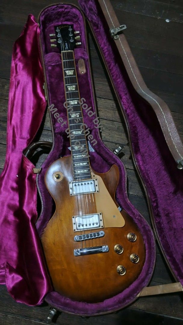1995 Gibson Les Paul Standard (Category: Musical Instruments) located in Manila. Submitted by retroactive_items (Listing ID 1430382558, Image 3). Description: 1995 Gibson Les Paul Standard ‎with Hardcase (working lock) ‎ ‎Model: Lespaul Standard ‎Year: 1995 ‎Color: Honeyburst / Plain top ‎Condition: No problems on playability and usage. Stock parts. Except Strap locks. ‎Dull finish. Buckle Rash. Minor Scratches and Dings. Probably needs setup or 
