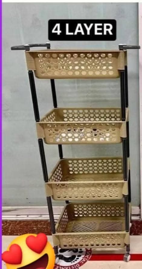 4-Layer Storage Rack with Wheels (Category: Storage Boxes & Baskets) located in Manila. Submitted by lyfrancois14 (Listing ID 1430231973, Image 2). Description: 4-layer storage rack is perfect for organizing your items. It features four spacious baskets and a sturdy frame. The rack is equipped with wheels for easy mobility. Available in beige and gray colors. Ideal for use in the kitchen, bathroom, or any space needing extra storage..