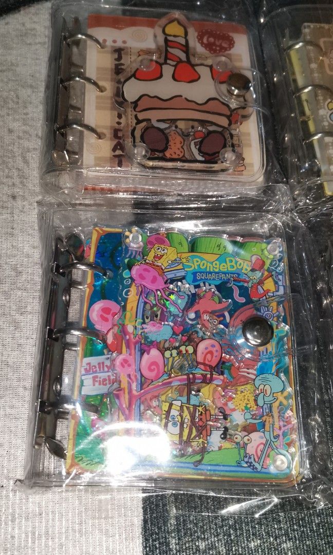 Acrylic Shaker Notebook (Category: Stationery & School Supplies) located in Quezon City. Submitted by declutterme04 (Listing ID 1430328135, Image 1). Description: 250 each nalang a8 size mini phto album, cash album. Original price at 600+ from dahao store. DECLUTTER SALE 180 ❤️ Open for take all may less pa.