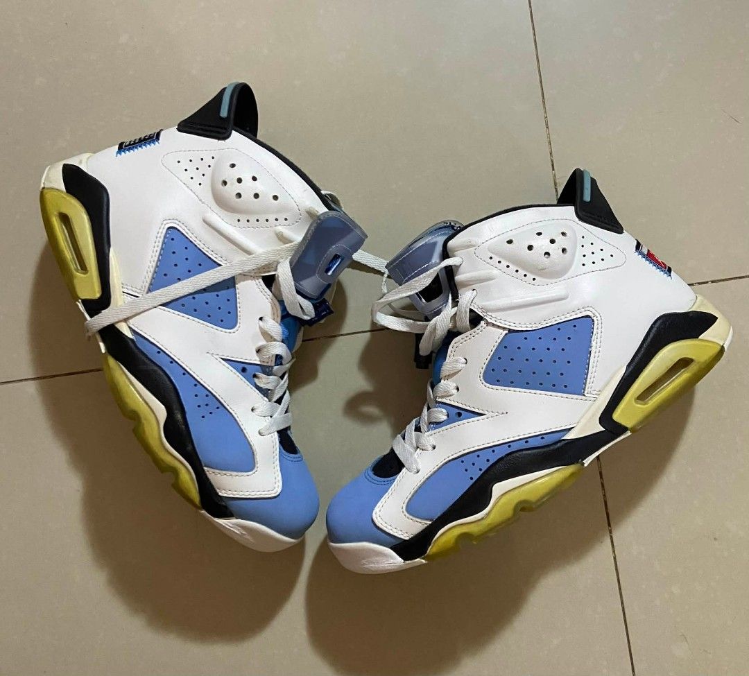Air Jordan 6 Retro UNC (Category: Sneakers) located in Caloocan City. Submitted by y2kgearrr (Listing ID 1430237202, Image 1). Description: Air Jordan 6 Retro in a white, blue, and black colorway. Features a white leather upper with blue accents on the tongue, toe, and midsole. The midsole also has a yellowed tint. The shoe has a black outsole and a visible Air unit in the heel. Includes white laces..