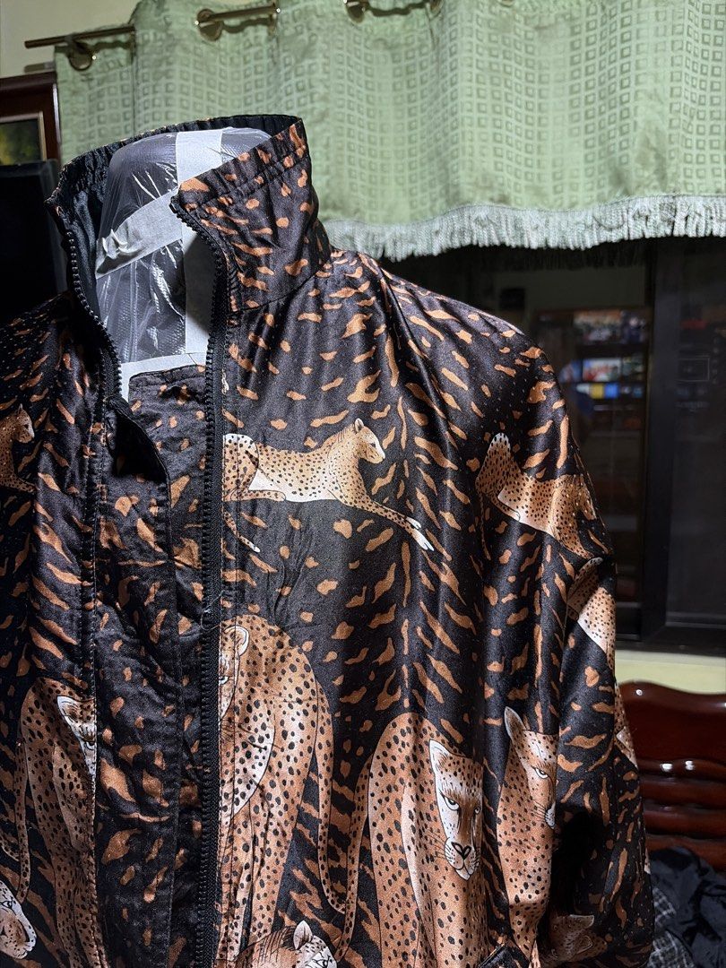 Animal Print Jacket (Category: Coats, Jackets and Outerwear) located in Makati City. Submitted by secondselection (Listing ID 1430252561, Image 3). Description: W 24-26 low longsleeves L 25.
