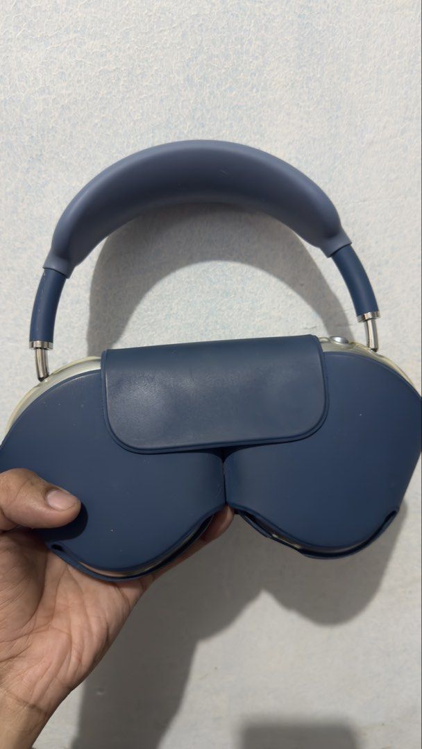 Apple AirPods Max - Blue (Category: Headphones & Headsets) located in Pateros City. Submitted by silasweir (Listing ID 1430274548, Image 1). Description: Apple AirPods Max in blue. The headphones have a blue headband and earcups. The earcups are a light grey color. The headphones come with a blue carrying case. Cushions for replacement. Slightly negotiable.