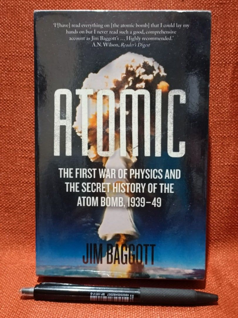Atomic: The First War of Physics by Jim Baggott (Category: Storybooks) located in Manila. Submitted by krishna_ayanami (Listing ID 1430220696, Image 1). Description: Book, "Atomic: The First War of Physics and the Secret History of the Atom Bomb, 1939-49" by Jim Baggott, delves into the history of the atom bomb. It includes a quote from A.N. Wilson, Reader's Digest. The book's cover features the title "ATOMIC" in large white letters above an imag