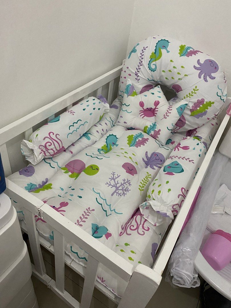 Baby Crib Set with Sea Creature Design (Category: Cots & Cribs) located in Las Pinas. Submitted by beautiqbya (Listing ID 1430342067, Image 2). Description: White wooden crib crib and bed comforter only. pillows are not included..