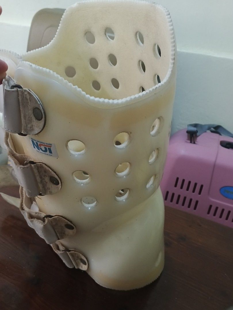 Back Brace with Straps (Category: Braces, Support & Protection) located in Caloocan City. Submitted by surplusandbnewshop (Listing ID 1430275233, Image 2). Description: Back brace with multiple straps and a perforated design. Features a curved shape for support and comfort. Includes adjustable straps for a secure fit. The brace has a beige color. The brand name "NOT" is visible on the brace..