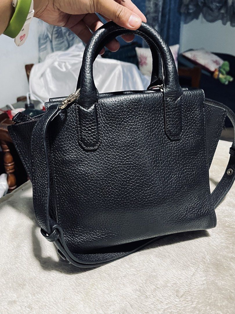 Bruno Magli Black Leather Handbag replaced strap (Category: Luxury Bags & Wallets) located in Mandaue City. Submitted by chuchi152615 (Listing ID 1430320776, Image 3). Description: with issue zipper is broken .