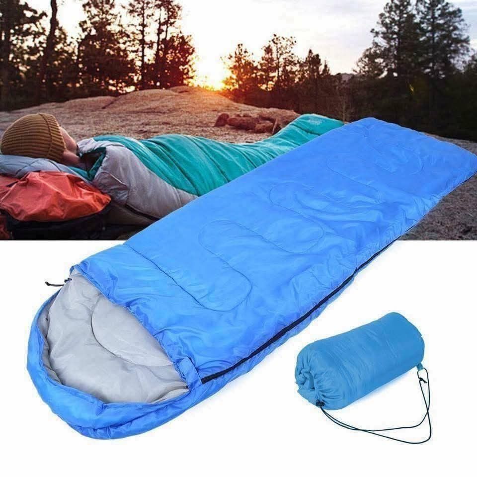 Camping Sleeping Bag (Category: Hiking & Camping) located in Manila. Submitted by lyfrancois14 (Listing ID 1430232357, Image 3). Description: Lazy bag is perfect for camping and mountaineering adventures. It provides a comfortable place to rest after a day of activities in the wild. The bag is blue and gray, and it can be easily rolled up and stored in its included carrying bag..