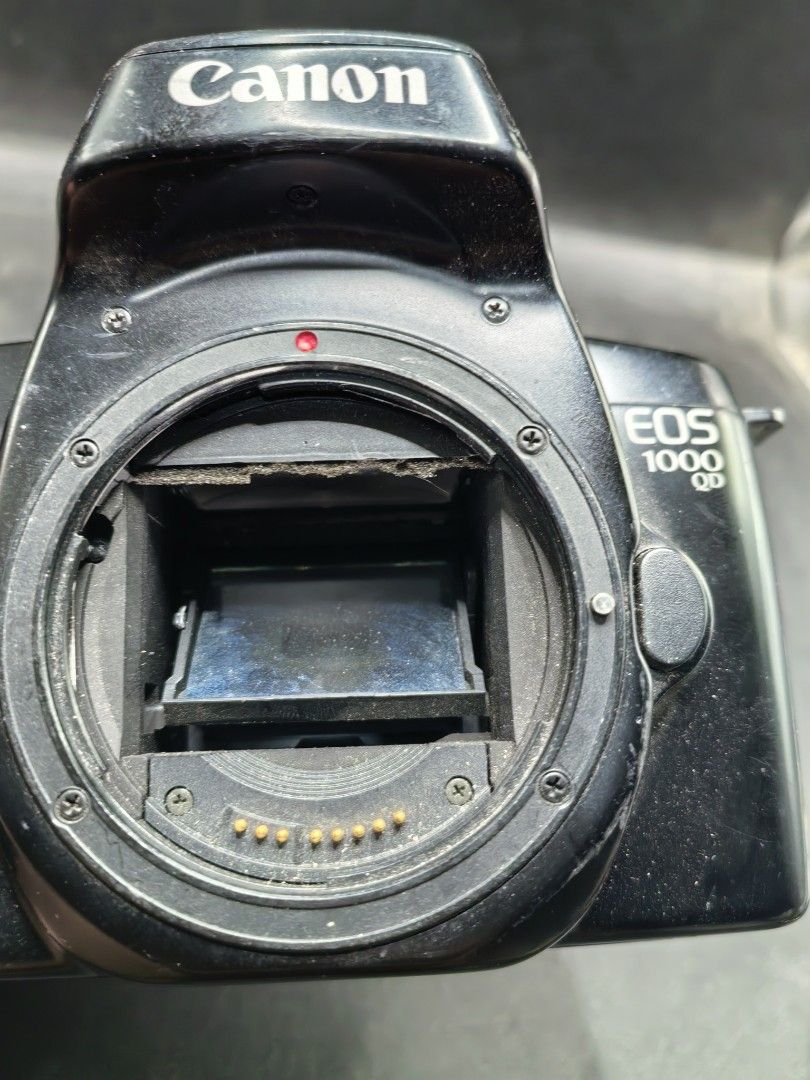 Canon EOS 1000 QD (Category: Cameras) located in Cebu City. Submitted by dudes_villanueva (Listing ID 1430217146, Image 3). Description: Canon EOS 1000 QD (also known as the EOS Rebel II QD in North America) - 1990s. Unit 2 - With Issue Note: Function but with issue. All sales final and non-refundable. Battery not included for testing and demo only Issue: Badly Damaged Curtain For Restoration, collection, or parts. 📌 Type: 35mm autofocus single-
