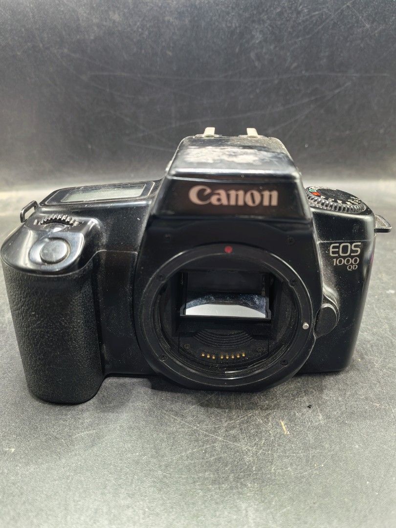 Canon EOS 1000 QD (Category: Cameras) located in Cebu City. Submitted by dudes_villanueva (Listing ID 1430217146, Image 1). Description: Canon EOS 1000 QD (also known as the EOS Rebel II QD in North America) - 1990s. Unit 2 - With Issue Note: Function but with issue. All sales final and non-refundable. Battery not included for testing and demo only Issue: Badly Damaged Curtain For Restoration, collection, or parts. 📌 Type: 35mm autofocus single-