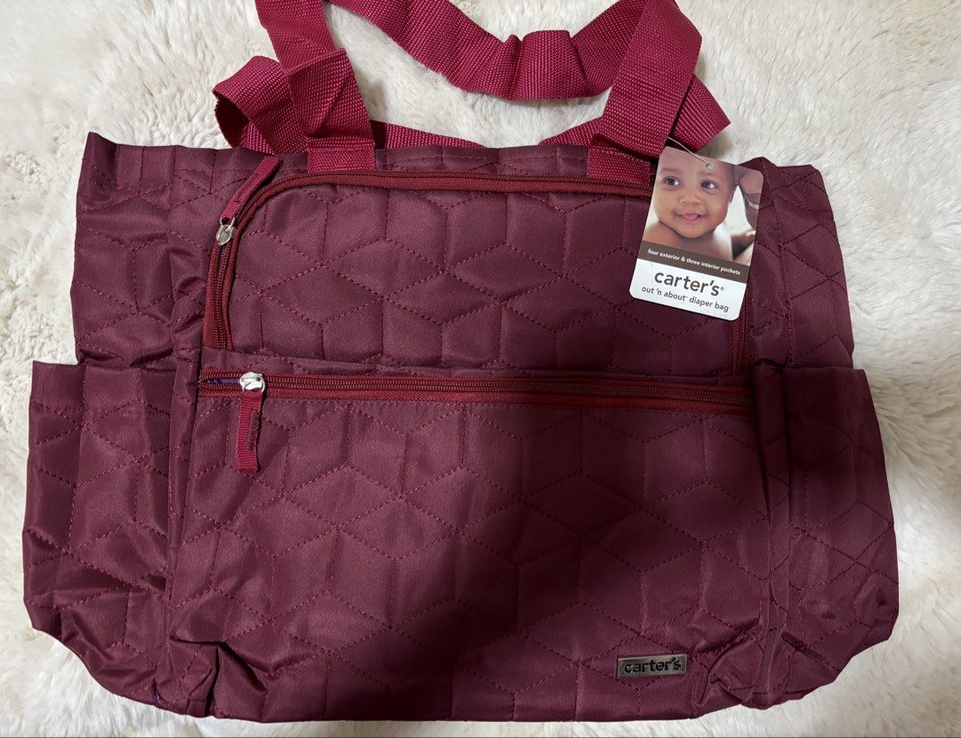 Carter's Quilted Diaper Bag (Category: Diaper Bags & Wetbags) located in Batangas. Submitted by aveena0413 (Listing ID 1430328757, Image 1). Description: Carter’s Quilted Diaper Bag Brand new ✨ Color: Maroon exterior with violet interior 💜 ✔️ Spacious and lightweight ✔️ Quilted design (stylish & classy) ✔️ Multiple compartments for baby essentials ✔️ Perfect for moms on-the-.