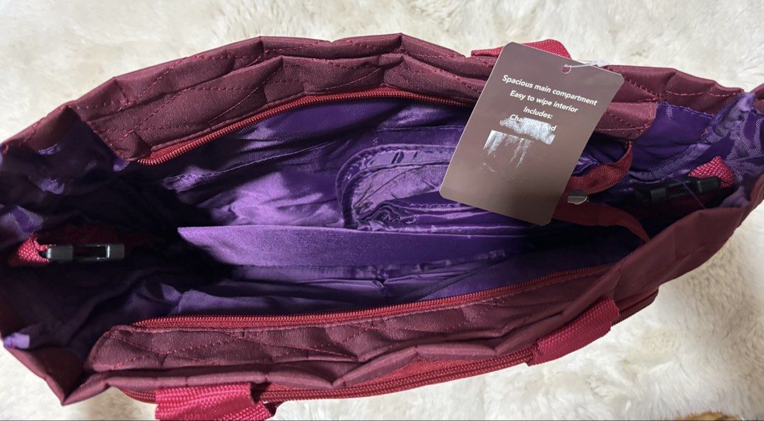 Carter's Quilted Diaper Bag (Category: Diaper Bags & Wetbags) located in Batangas. Submitted by aveena0413 (Listing ID 1430328757, Image 3). Description: Carter’s Quilted Diaper Bag Brand new ✨ Color: Maroon exterior with violet interior 💜 ✔️ Spacious and lightweight ✔️ Quilted design (stylish & classy) ✔️ Multiple compartments for baby essentials ✔️ Perfect for moms on-the-.