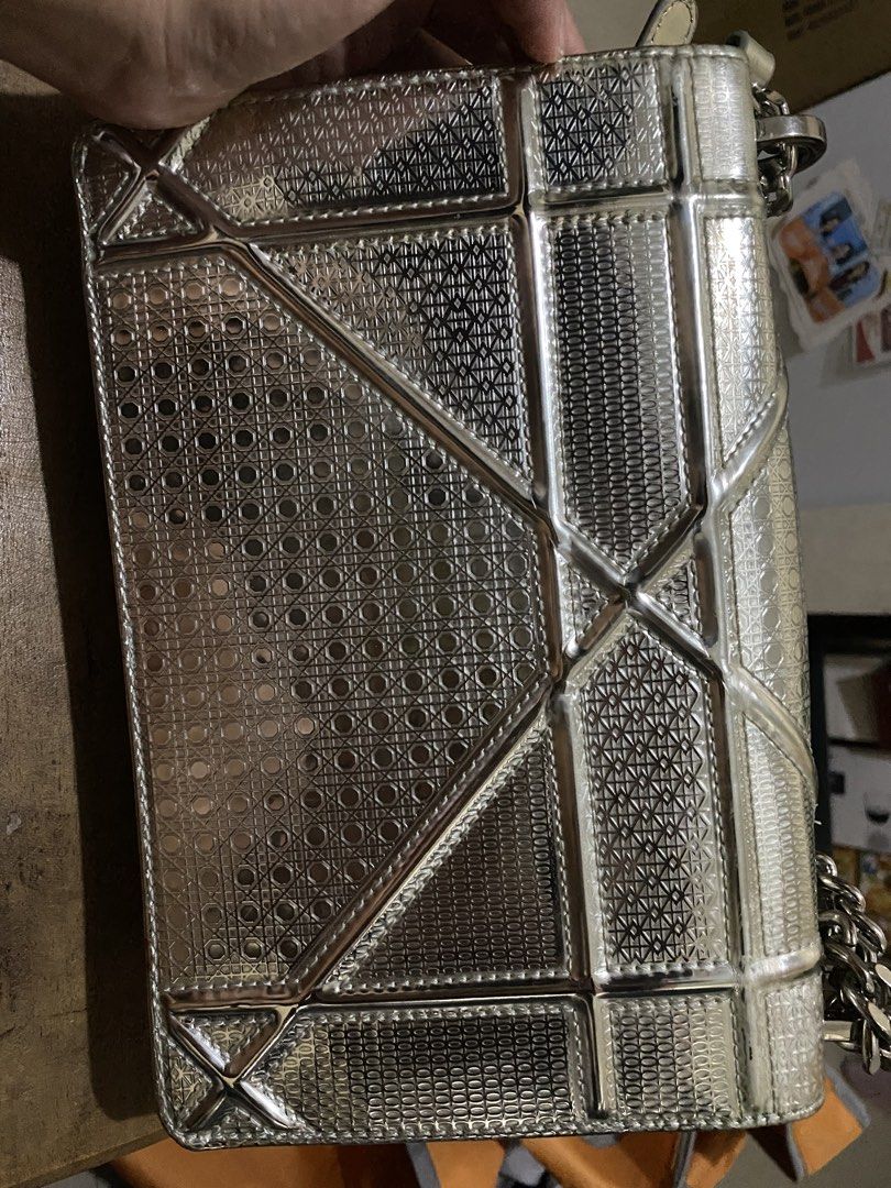 CD Metallic Silver Diorama Shoulder Bag (Category: Luxury Bags & Wallets) located in Munoz. Submitted by harm0nica337 (Listing ID 1430280759, Image 2). Description: Thrifted item, unknown authenticity, refer to the pics Flaws: Signs of use as shown in the last 3 pics MOP: Gcash (Price +SF) J&T express.