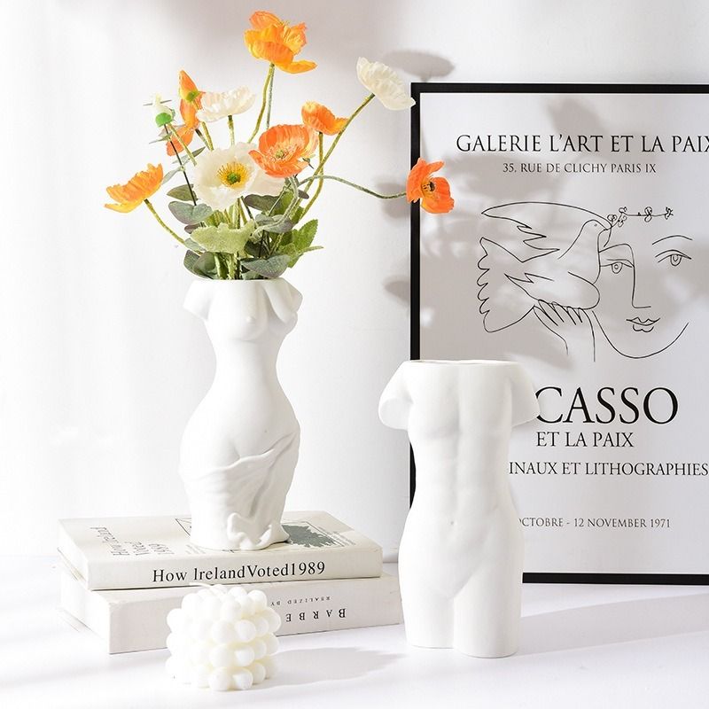 Ceramic Flower Vase Pot Table Centerpiece Home Decor (Category: Vases & Decorative Bowls) located in Manila. Submitted by winterbliss (Listing ID 1430278414, Image 3). Description: Materials: Ceramic Size: - Hand : L:10 W:10 H:16 (cm) ; Vase opening diameter: 10 (cm) - Body : L:12 W:12 H:24 (cm) ; Vase opening diameter: 7*4.5 (cm) - Half A : L:12.5 W:12.5 H:17 (cm) ; Vase opening diameter: 8*5 (cm) - Half B : L:12.5 W:12.5 H:17.5 (cm) ; Vase open