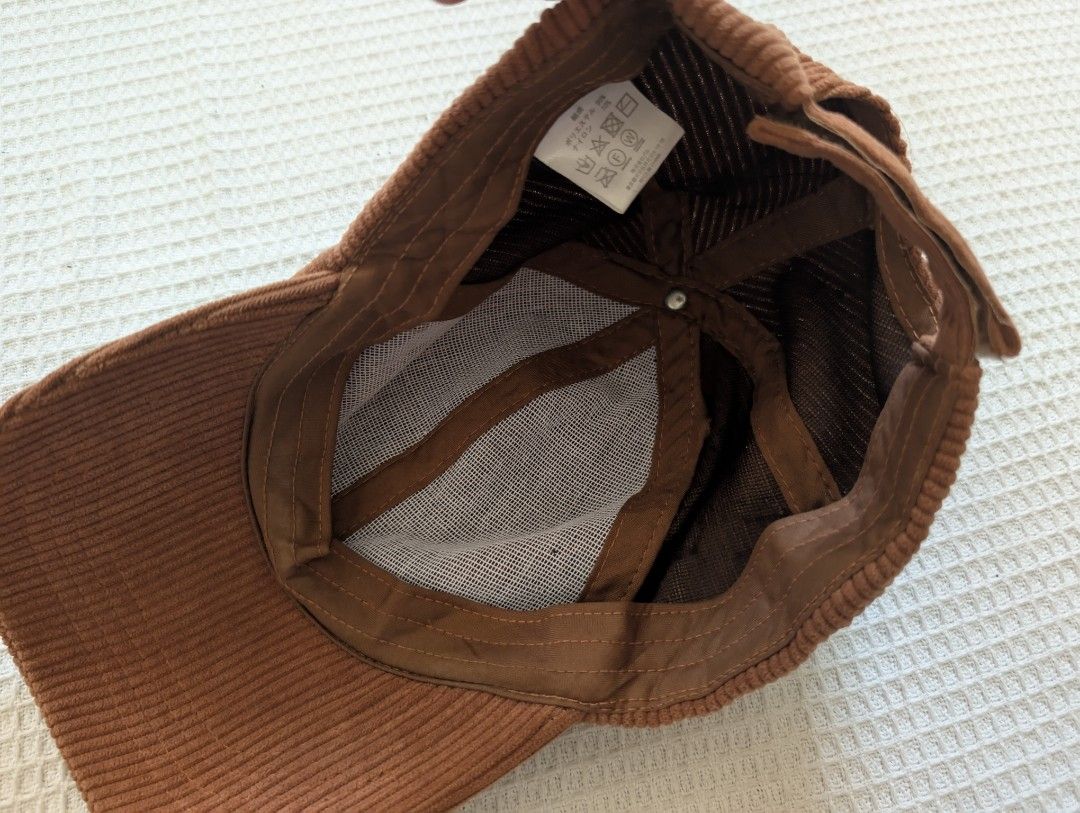 Corduroy Brown Cap (Category: Caps & Hats) located in Binan City. Submitted by fabpanda (Listing ID 1430294993, Image 2). Description: Brown corduroy cap. Features a curved brim and adjustable strap at the back. The interior has a mesh lining for breathability. Great for your 'estetik' instagrammable fits!🐼 God bless! ☺️🙏.