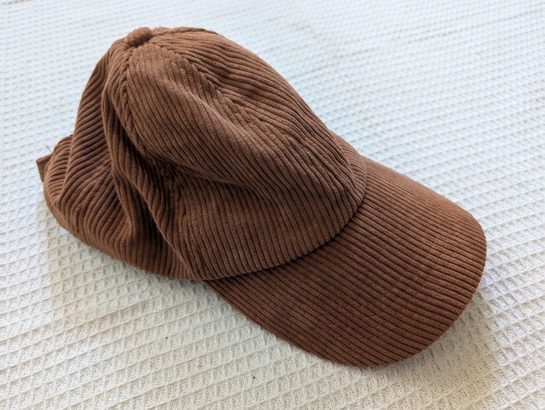 Corduroy Brown Cap (Category: Caps & Hats) located in Binan City. Submitted by fabpanda (Listing ID 1430294993, Image 1). Description: Brown corduroy cap. Features a curved brim and adjustable strap at the back. The interior has a mesh lining for breathability. Great for your 'estetik' instagrammable fits!🐼 God bless! ☺️🙏.