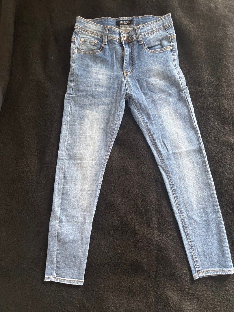 Daniel Original Denim Skinny Jeans (Category: Jeans) located in Quezon City. Submitted by donbuys (Listing ID 1430233165, Image 2). Description: Light blue denim jeans from Daniel Original. Features a button closure and classic five-pocket design. The waist measures approximately 14 inches across. The inseam is around 30-36 inches. The jeans have a straight leg cut. Perfect for everyday wear..