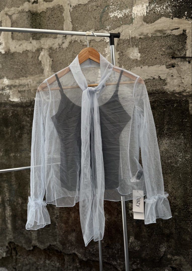 Dazy Sheer Tie-Neck Blouse (Category: Blouses) located in Marikina City. Submitted by peppermint101 (Listing ID 1430377650, Image 1). Description: Size: Small to Medium Ziplock .