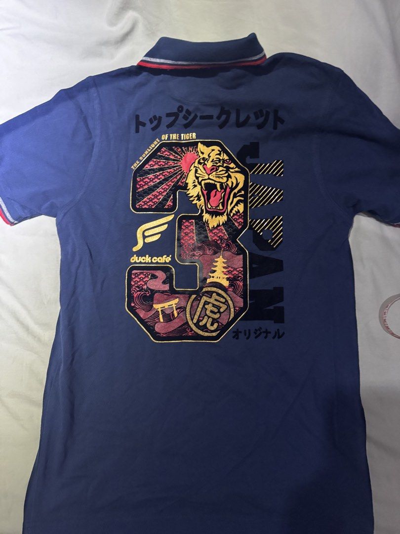 Duck Cafe Japan Polo Shirt (Category: Tshirts & Polo Shirts ) located in Manila. Submitted by jargoo (Listing ID 1430346174, Image 3). Description: 17 x 26.