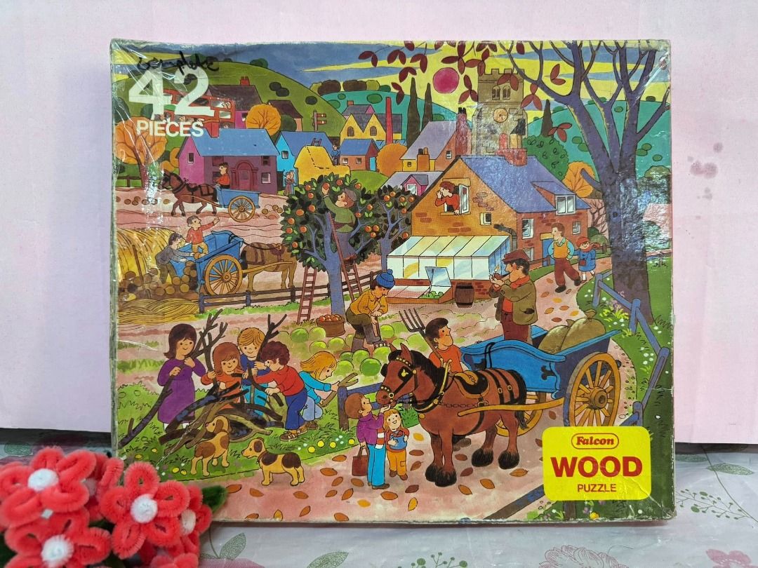 Falcon Wood Puzzle 42 Pieces (Category: Board Games & Puzzles) located in Caloocan City. Submitted by brightgamesph (Listing ID 1430254676, Image 1). Description: Vintage Falcon Wood Puzzle featuring a charming countryside scene with 42 pieces. The puzzle depicts a village with houses, people, and a horse-drawn cart. The box has a yellow sticker indicating it is a wood puzzle..