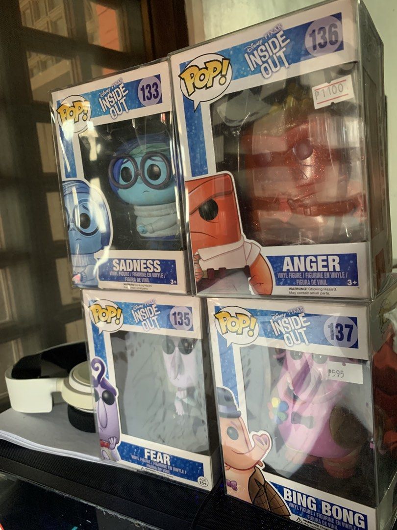 Funko Pop! Inside Out set (Category: Designer & Blind Box Toys) located in Manila. Submitted by robertzombie (Listing ID 1430259849, Image 1). Description: Set of four Funko Pop! vinyl figures from the Disney Pixar movie Inside Out. Includes Sadness (133), clear red Anger (136), Fear (135), and Bing Bong (137). Each figure is in its original box. Perfect for collectors or fans of the movie. 09153896941 e2.