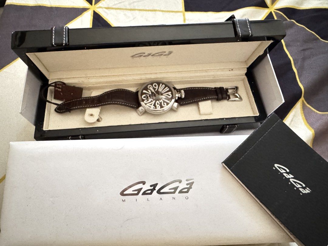 GaGa Milano Manuale 48mm Watch (Category: Luxury Watches) located in Caloocan City. Submitted by r_h_e_a10 (Listing ID 1430273672, Image 2). Description: Authentic GaGa Milano Manuale 48mm watch. Features a brown dial with large white numerals and a brown leather strap. The watch has a visible mechanical movement on the back. Comes with the original box and papers. Made in Italy..