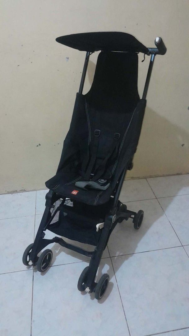 GB Pockit Stroller - Black (Category: Strollers) located in Caloocan City. Submitted by Unicoijo02 (Listing ID 1430398283, Image 2). Description: Compact and lightweight GB Pockit stroller in black. Features a sun canopy and a secure harness system. The stroller folds up for easy storage and transport. It has four sets of wheels for stability and maneuverability..