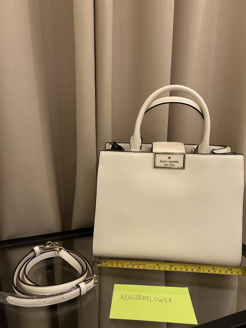 Kate Spade Reegan Top handle bag (Category: Luxury Bags & Wallets) located in Pasay City. Submitted by kevgoodflower (Listing ID 1430305329, Image 1). Description: Kate spade Reegan top handle Bought from Kate Spade CA outlet With detachable Crossbody strap Gold Hardware Off white saffiano leather Nylon interior lining Tags intact.