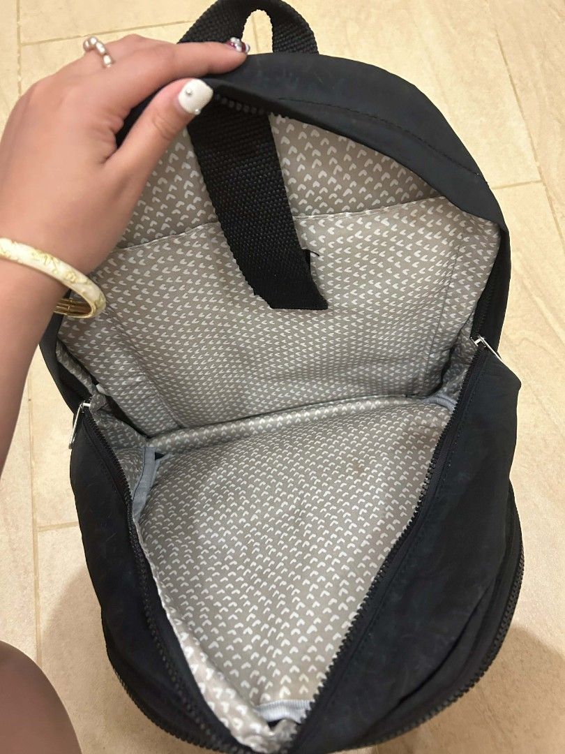 Kipling Black Backpack (Category: Backpacks) located in Mandaue City. Submitted by robertnpompompurin (Listing ID 1430316678, Image 2). Description: Orginal Kipling Bag Bought from Taiwan back in 2018 Negotiable Issues: Stain from coffee spill back in 2019 when in the UK. Wasn't able to remove stain. .